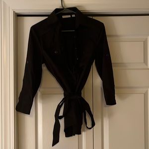 This is a cute black top with a belt and it has 3/4 length sleeves & a size S